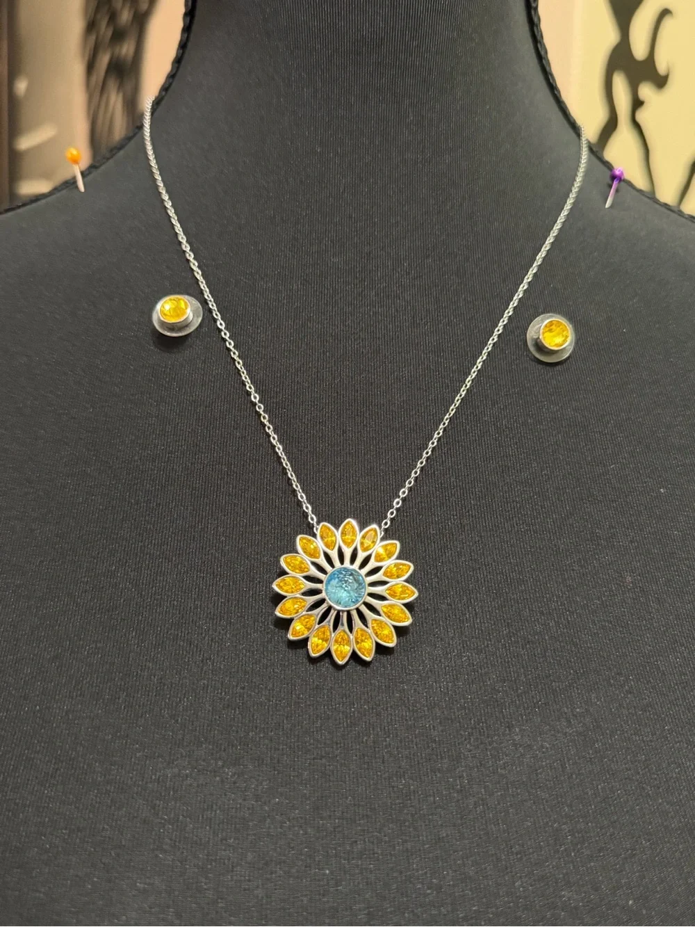 Touchstone Crystal Sunflower Necklace with yellow stud earrings